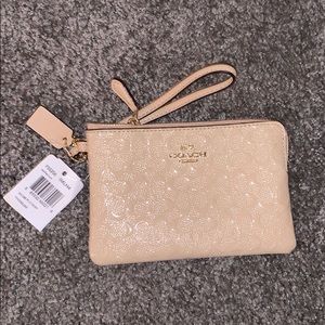 BRAND NEW coach wristlet!!